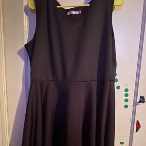 Mid length sleeveless black dress